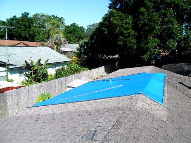 Shingle tile roofing in progress